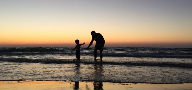 Parent and Child on a Beach